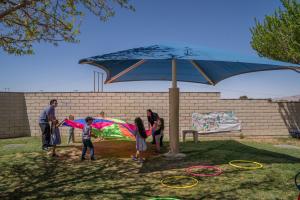 Child Development Instruction Lab- Children parachuting 